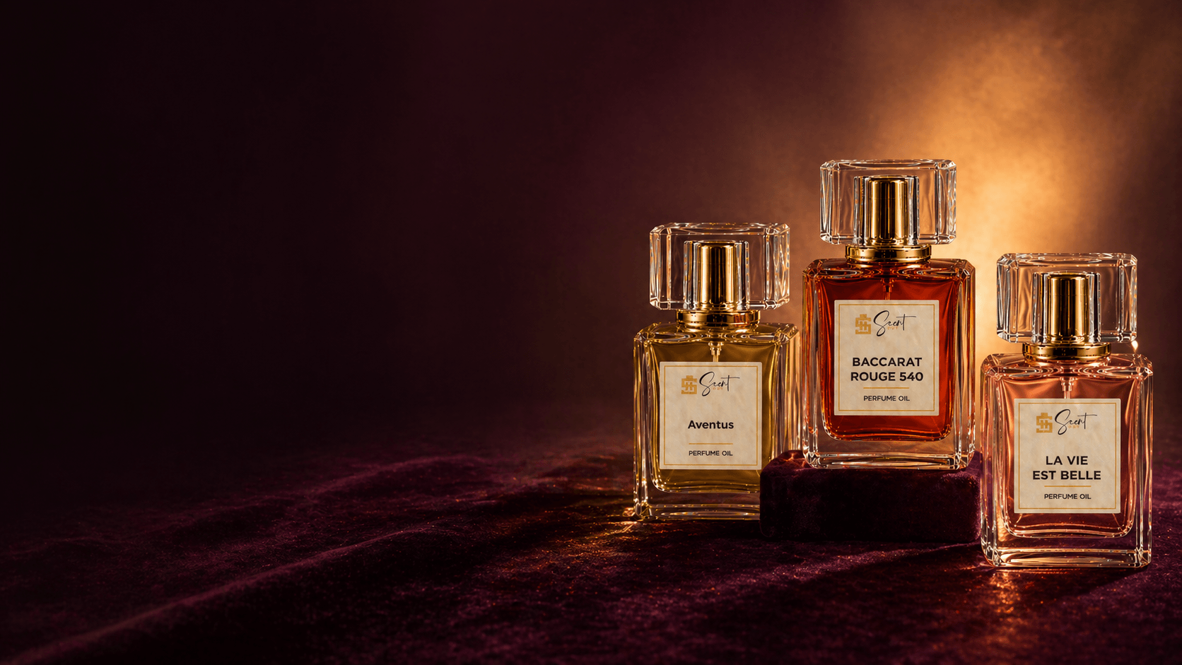 Three Scenthut perfume oil bottles on aubergine velvet